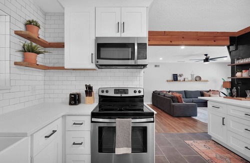 Lakewood House | Mid-Century Boho Chic home with Pool, Game Room & Outdoor Playhouse.