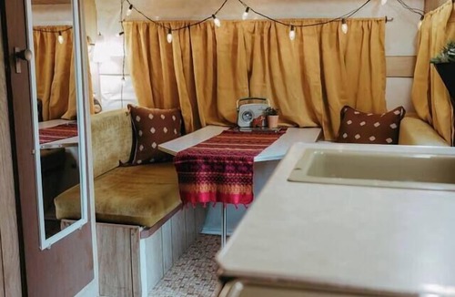 Wichita House | Mid-Century Charmer: Hot Tub, Stocktank Pool, Firepit, & Vintage Camper