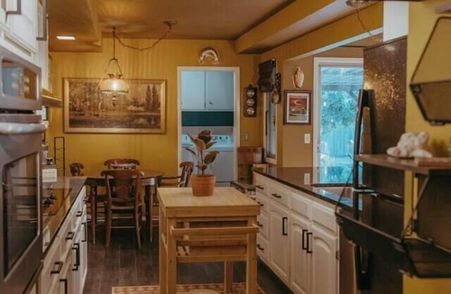 Wichita House | Mid-Century Charmer: Hot Tub, Stocktank Pool, Firepit, & Vintage Camper