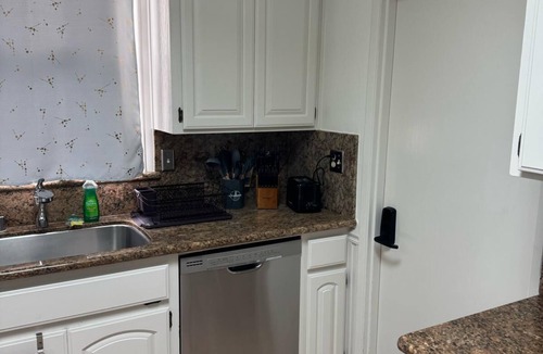 East San Mateo House | Mid Century Garden View Home Parking