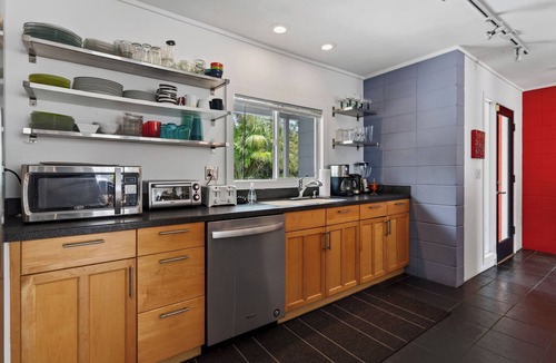 South Sarasota House | Mid-Century Modern W/Private Lap Pool In secluded Garden and art studio