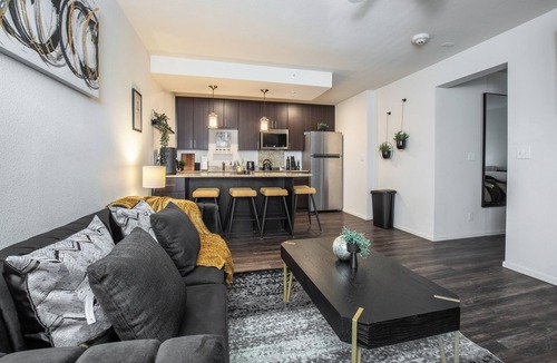 Overland Park Apartment | Mid-Rise Luxury 1 BR 1 BD Free Carport Parking WiFi and Dedicated Workspace