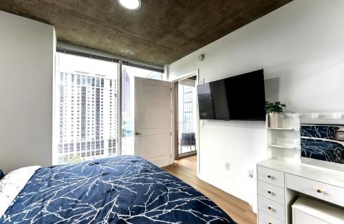 Midtown Apartment | Midtown LuxePad 1B1B with Pool Gym Grills Xbox