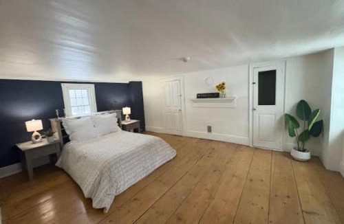 Gilmanton House | Mini Cows, Trails & Cozy Porch