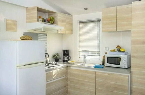 Pommeuse House | Mobil-home | Classic | 2 Ch. | 4 pers. | Uncovered elevated terrace | A/C