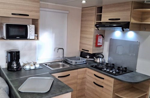 La Cote Radieuse RV Rental | Mobile Home 'Mobil-home Camping Mar Estang' with Lake View, Shared Pool & Air Conditioning