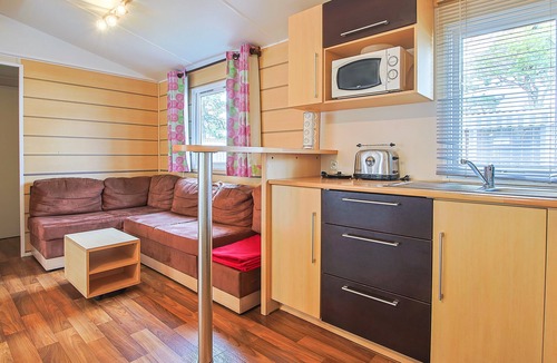 Saint-Jean-de-Monts RV Rental | Mobile Home 'Mobilhome Tout Équipé Bois Masson' with Shared Pool and Shared Terrace