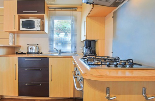 Saint-Jean-de-Monts RV Rental | Mobile Home 'Mobilhome Tout Équipé Bois Masson' with Shared Pool and Shared Terrace