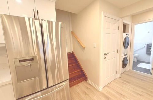 Cooksville Apartment | Modern 1-Bedroom Private Suite near SQUARE ONE w/Laundry, EV Charger & BBQ Area
