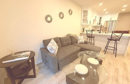 Cooksville Apartment | Modern 1-Bedroom Private Suite near SQUARE ONE w/Laundry, EV Charger & BBQ Area