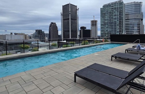 International District Apartment | Modern 1BR Apt with Stunning Views and Pool Access