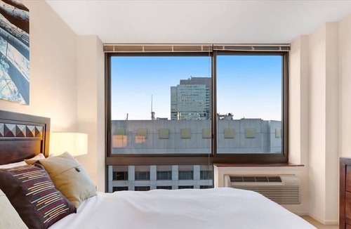 Hudson Exchange Apartment | Modern 1BR | Full Kitchen | W/D | NYC Views | by GLS