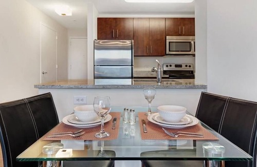 Hudson Exchange Apartment | Modern 1BR | Full Kitchen | W/D | NYC Views | by GLS