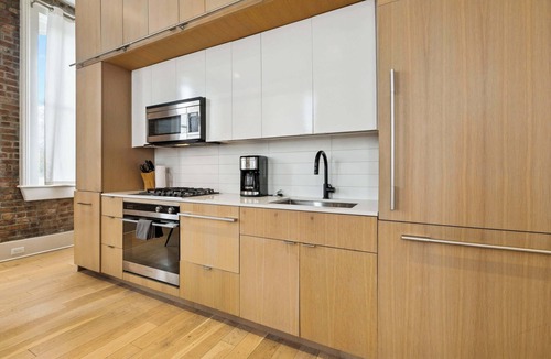 Tulane - Gravier Apartment | Modern 1BR in Historic Schoolhouse | Gated Parking
