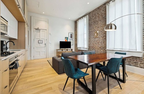 Tulane - Gravier Apartment | Modern 1BR in Historic Schoolhouse | Gated Parking