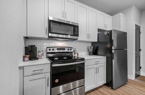 Rogers Apartment | Modern 1BR - Pool & Gym, Near Walmart & In-Unit Bike Storage