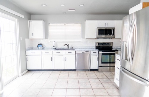 Northeast Carrollton House | Modern 2-bedroom home with loft and indoor fireplace!