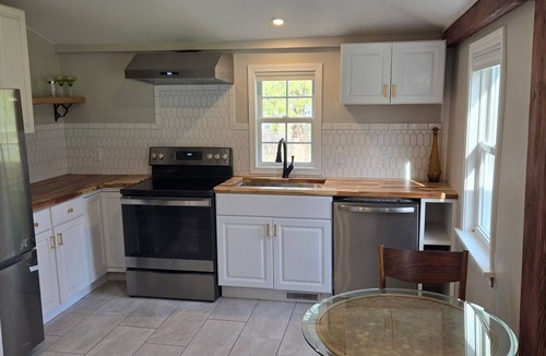 Penfield House | Modern 2-bedroom townhome in Penfield with a vintage touch