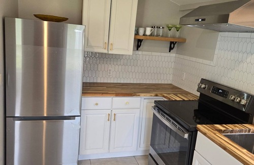 Penfield House | Modern 2-bedroom townhome in Penfield with a vintage touch