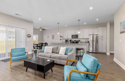 Grandville Condo | Modern 2BR + 2BA Condo with Garage & Patio