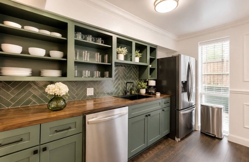 Junius Heights Condo | Modern 2BR/2BA luxury condo in central Dallas with a private patio, stylish interiors, and access to an award-winning courtyard featuring a resort-style pool, hot tub, dry sauna, and cold plunge. Perfect for business trips, leisure, or extended stays