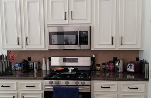 Pearland House | Modern 2br house with glass fireplace and patio.
