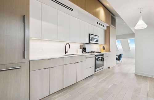 Tulane - Gravier Apartment | Modern 2BR in Historic Schoolhouse | Gated Parking | Near Superdome