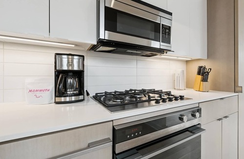 Tulane - Gravier Apartment | Modern 2BR in Historic Schoolhouse | Gated Parking | Near Superdome