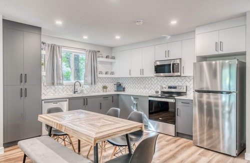 Crescent Heights Apartment | Modern 3 bed, 2 bath with an Unbeatable location and HOT TUB!