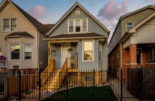 Logan Square Apartment | Modern 3-Bed Stay w/Patio, Firepit, & Garage Parking Spot