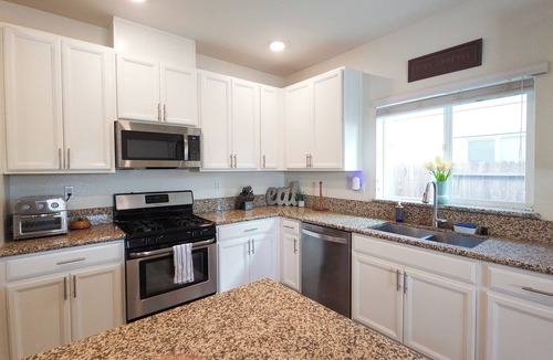 Roseville House | Modern 3-bedroom house w/solar heated saltwater pool + workspace