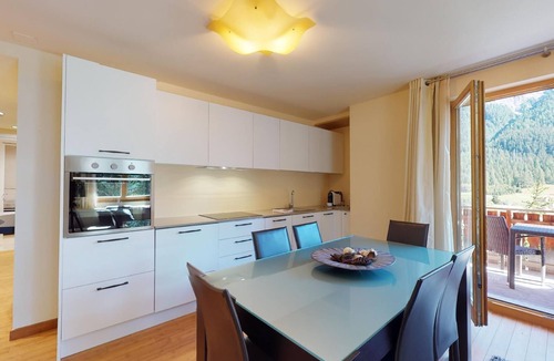 Madulain Apartment | Modern 3½ room flat on the ground floor, approx.