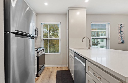 South Congress Condo | Modern 3BR/2BA with large pool in HEART of SOCO!