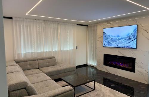 Heimberg Apartment | Modern 3BR Apartment with Fireplace, Miele Kitchen and Balcony