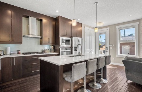 Southwest Calgary House | Modern 4-Bedroom Home Near Chinook Mall and Downtown with Private Garage!