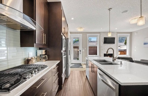 Southwest Calgary House | Modern 4-Bedroom Home Near Chinook Mall and Downtown with Private Garage!