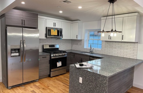 Queens House | Modern 4-bedroom townhome in lovely Jamaica with cool AC