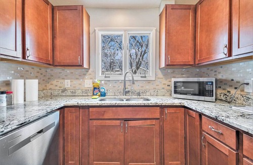 West Omaha House | Modern 4 BR Retreat | Arcade, Bounce House, Firepit, Grill