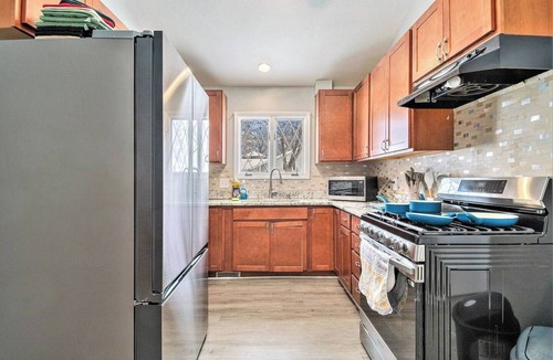 West Omaha House | Modern 4 BR Retreat | Arcade, Bounce House, Firepit, Grill
