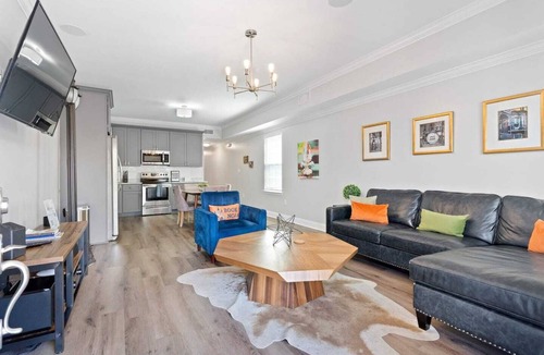 Tulane - Gravier Apartment | Modern 4BR Mid-City home with heated pool & parking. Steps to streetcar, near FQ & parades.