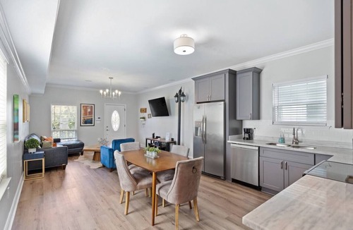 Tulane - Gravier Apartment | Modern 4BR Mid-City home with heated pool & parking. Steps to streetcar, near FQ & parades.