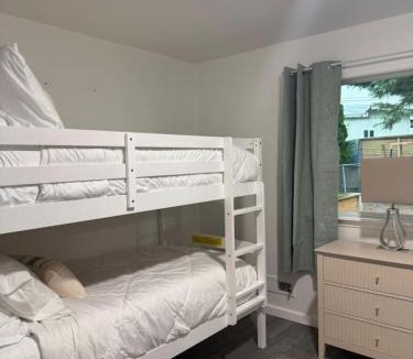 Shoreline House | Modern 7-Bedroom Home with Spacious Yard, A/C, Pet-Friendly, and King Beds