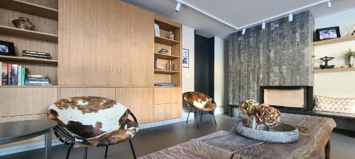 Flims Apartment | Modern Alpine Retreat Garden and Panoramic Views
