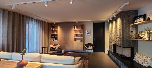 Flims Apartment | Modern Alpine Retreat Garden and Panoramic Views