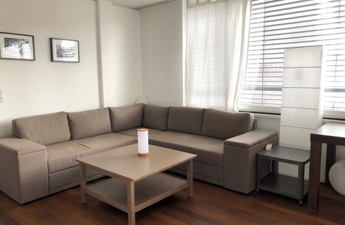 Escher Wyss Apartment | Modern and bright home by Prime Tower with workspaces & balcony