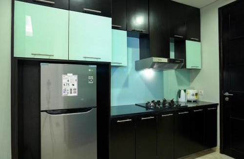 Karet Apartment | Modern and Comfortable 2BR at The Masterpiece Condominium Epicentrum Apartment By Travelio