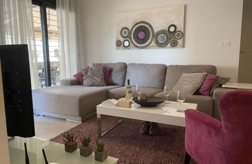 Torre de la Horadada Apartment | Modern apartment 250m from the sea with parking space behind gate