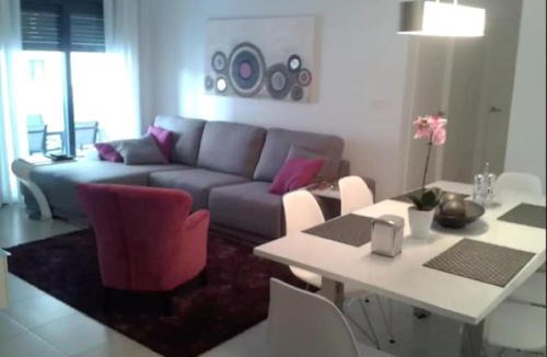 Torre de la Horadada Apartment | Modern apartment 250m from the sea with parking space behind gate