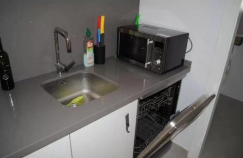 Torre de la Horadada Apartment | Modern apartment 250m from the sea with parking space behind gate