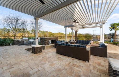 Grogan's Mill Apartment | Modern apartment with pool, gym, & patio pet-friendly